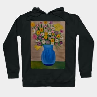 A still life painting of mixed flowers in a blue vase Hoodie